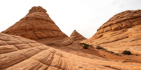 Unique Rock Formations at The Wave in Arizona under a Cloudy Sky