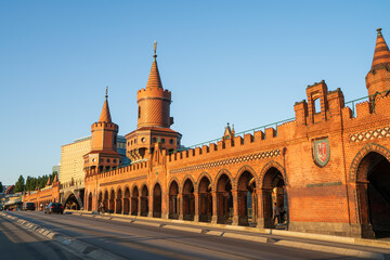 Oberbaum Bridge on soft sunset light in Berlin. Centre focus on the tower