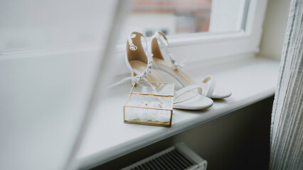 Wedding shoes and ring