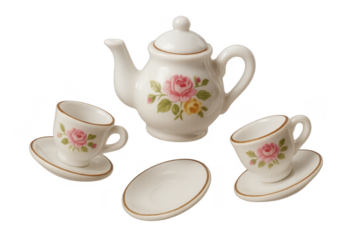 Miniature tea set with floral design isolated on transparent background, cute