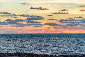 Stunning ocean view at sunset from Cancun Hotel Zone with dramatic clouds and glowing colors over the horizon High-quality photo