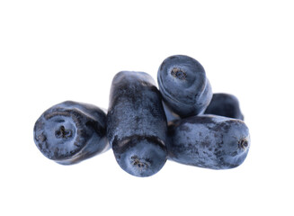 Honeysuckle berry isolated on white background. Fresh honeysuckle blue berry fruits. Clipping path.