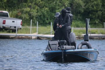 Fishing on the Trent Severn Waterway in Ontario Canada in black and masked