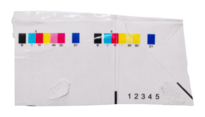 CMYK print test control scales on piece of cardboard from beverage package. Test chart offset