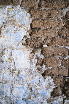 Close up of plaster covering an old stone wall at Fort Stanton Historic Site, New Mexico