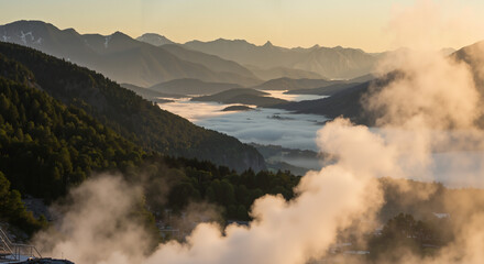 Misty mountain valley landscape at sunrise for travel and nature design
