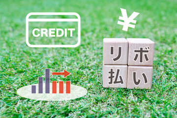 クレジットカードのリボ払い　クレジットカードとグラフのイラスト