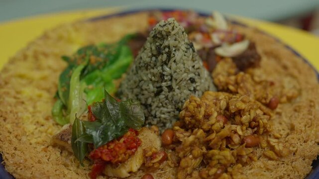 Delicious Indonesian Dishes, Nasi Rempah, Tempe Orek and Telur Dadar.