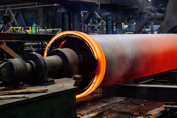 Iron pipe centrifugal pipe casting, new red hot freshly cast iron pipe at the foundry