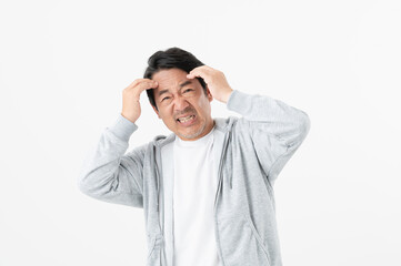 Naklejka premium 頭を抱えるミドルの男性
