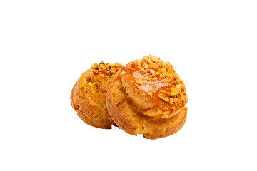 Two caramel cream puffs – PNG, front view, isolated on transparent background
