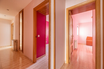  A long, well-lit hallway can create a sense of depth and spaciousness,