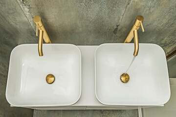 The location and design of the faucet are crucial to complementing the sink