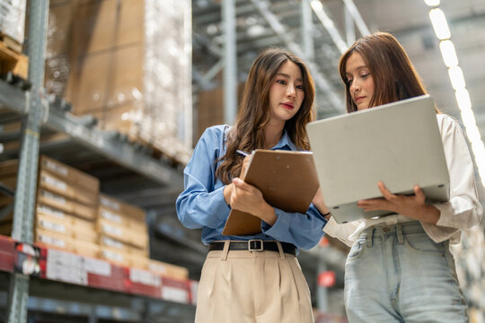 Female engineers team discussing inventory in warehouse logistics and supply chain planning, operation management, data analysis, warehouse shipping, inventory tracking, optimization and technology