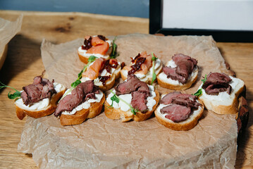 Gourmet Canapés with Roast Beef and Salmon.
