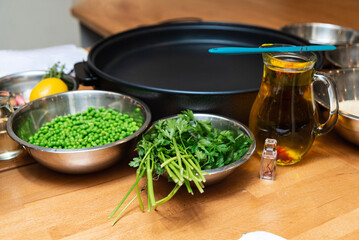 Fresh ingredients prepared for cooking paella.