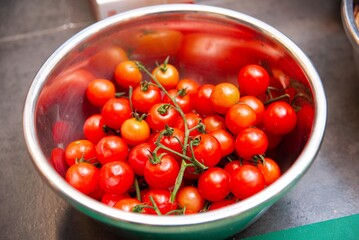 Fresh Cherry Tomatoes in Stainless Bowl.