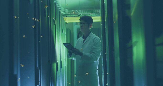 Korean technician in white lab coat inspecting server racks in data center, with tablet computer