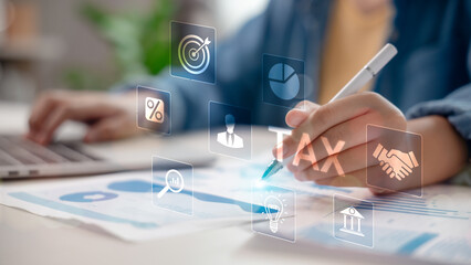 Close-up of hand analyzing financial data with tax and fintech icons overlay. Concept of smart tax planning, financial analytics, online accounting, percentage calculation, and business strategy.
