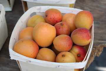 fresh peaches in a basket