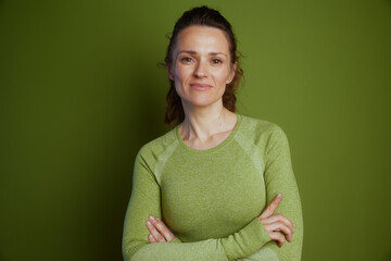 Self-assured woman in green shirt