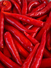 red chilli on a wooden plate, close up,