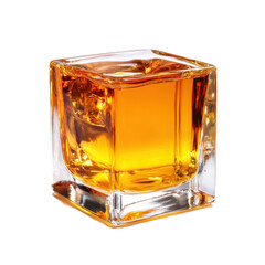 Glass of amber colored liquid sits in a square glass