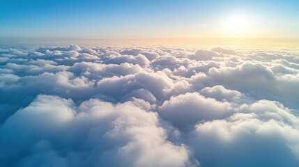 Aerial View of Fluffy Clouds at Sunset