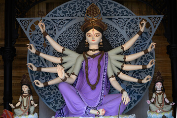 Idol of Goddess Devi Durga in a beautifully decorated pandal during the Durga Puja festival of Hinduism in West Bengal, India