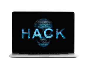 HACK, skull, blue digital text, and cyber threat displayed on laptop screen, symbolizing hacking, cybersecurity risk, and digital crime in modern technology environment