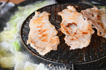 pork barbecue on frying pan, Thai style cuisine