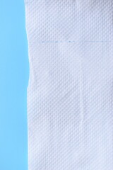white paper tissue on blue background