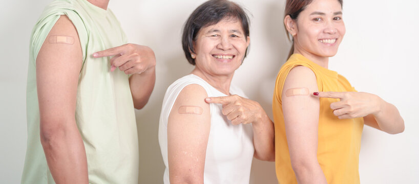 Adult and Senior group with bandage after received vaccine. Vaccination and Immunization for Influenza, HPV, Zoster, IPD, DTP, Dengue, Encephalitis, Rabies, Pneumococcal Hepatitis B and Covid vaccines - Powered by Adobe