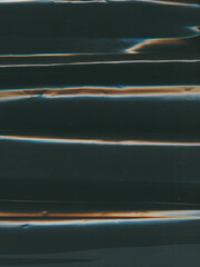 Glitch texture. Screen distortion. Orange dark black color analog noise vibration waves lines...