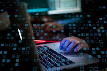 A hacker using computer photo
