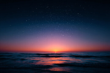 a sunset over the ocean with stars in the sky