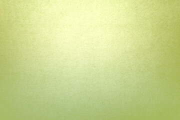 Bright light green tone color paint on blank eco environmental friendly cardboard box paper texture background with space minimal style 