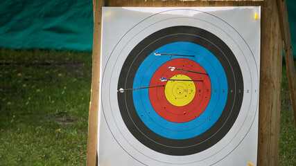 Close-Up of Archery Target Practice with Arrows in Bullseye