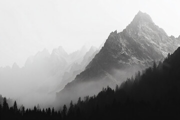 a black and white photo of a mountain range