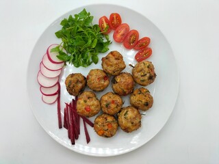 Deep fried pork meatballs mixed with hot and spicy Thai spices. Fusion food that combines the West...