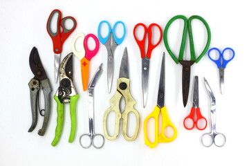 Scissors for various types of cutting, such as for use with fabric, paper, industrial sheet metal, cutting crab claws on dining tables, plastic scissors for children, or scissors for cutting branches.