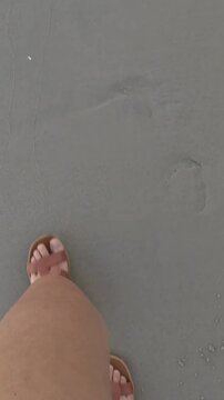 Walking Barefoot on Wet Sand