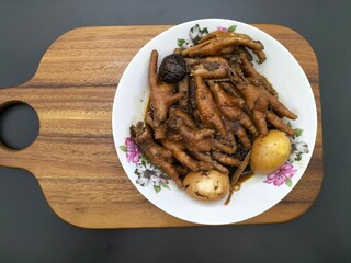 The best dish, chicken feet and stewed eggs ready to serve, the original recipe from China has been...