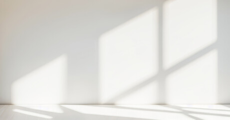 Clean architectural wall design with sunlight streaming in to create soft and peaceful shadow patterns in an indoor setting