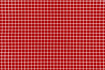 a red and white tiled wall with a white grid