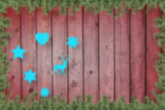 Fototapeta Blurred fir tree branches on wood