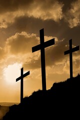 Cross religion symbol shape over sunset sky
