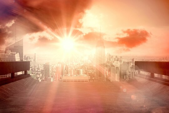 Naklejki Sun shining over road and city