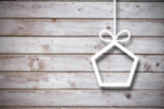 Fototapeta Blurred christmas decorations on wood