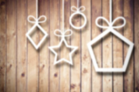 Fototapeta Blurred christmas decorations on wood